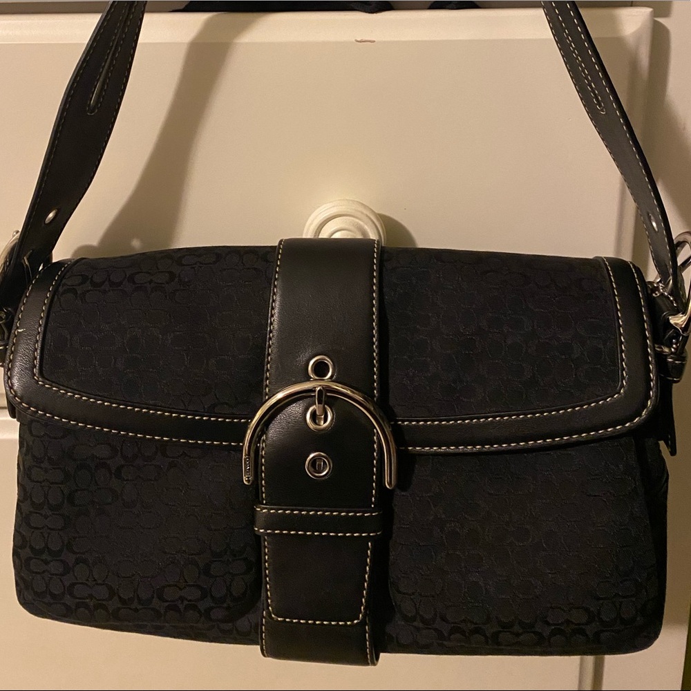 Like New , with receipt, original tags not attached and dust bag.